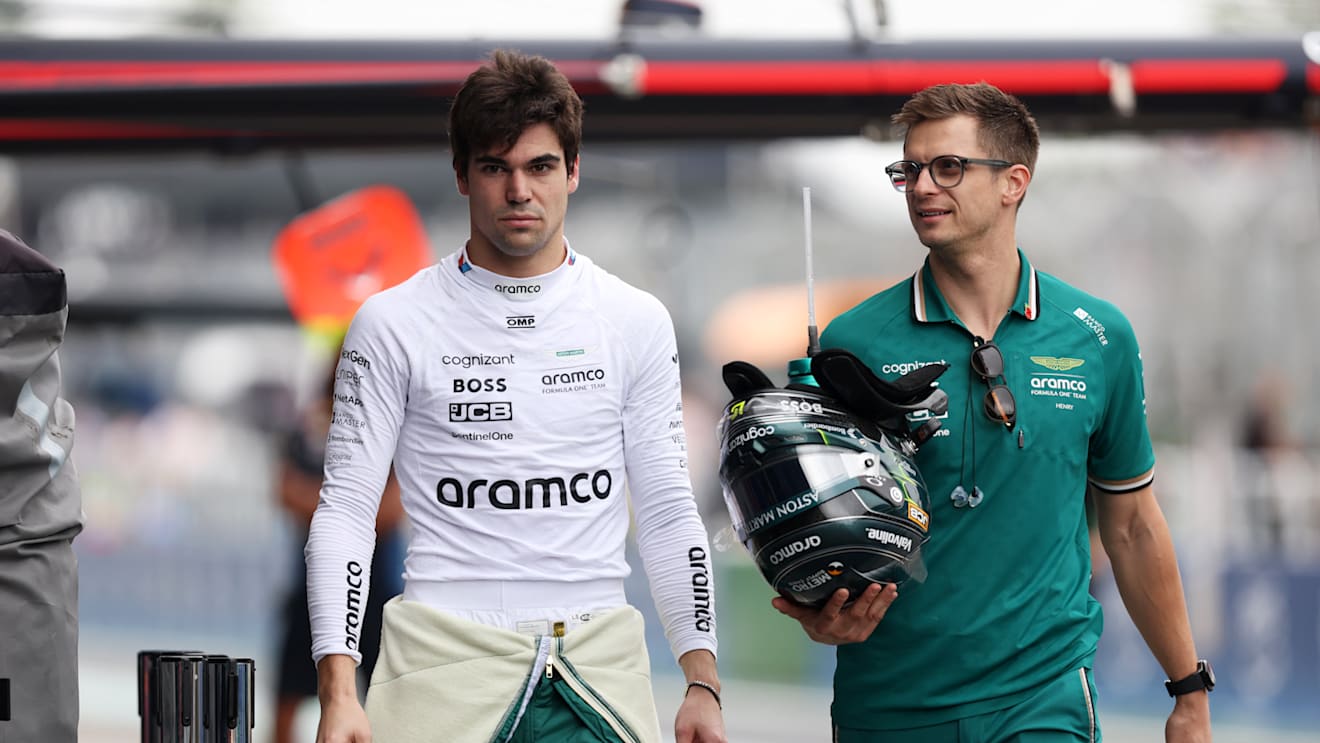 SAO PAULO, BRAZIL - NOVEMBER 01: 19th placed qualifier Lance Stroll of Canada and Aston Martin F1 Team walks in the Pitlane during Sprint Qualifying ahead of the F1 Grand Prix of Brazil at Autodromo Jose Carlos Pace on November 01, 2024 in Sao Paulo, Brazil. (Photo by Lars Baron - Formula 1/Formula 1 via Getty Images)