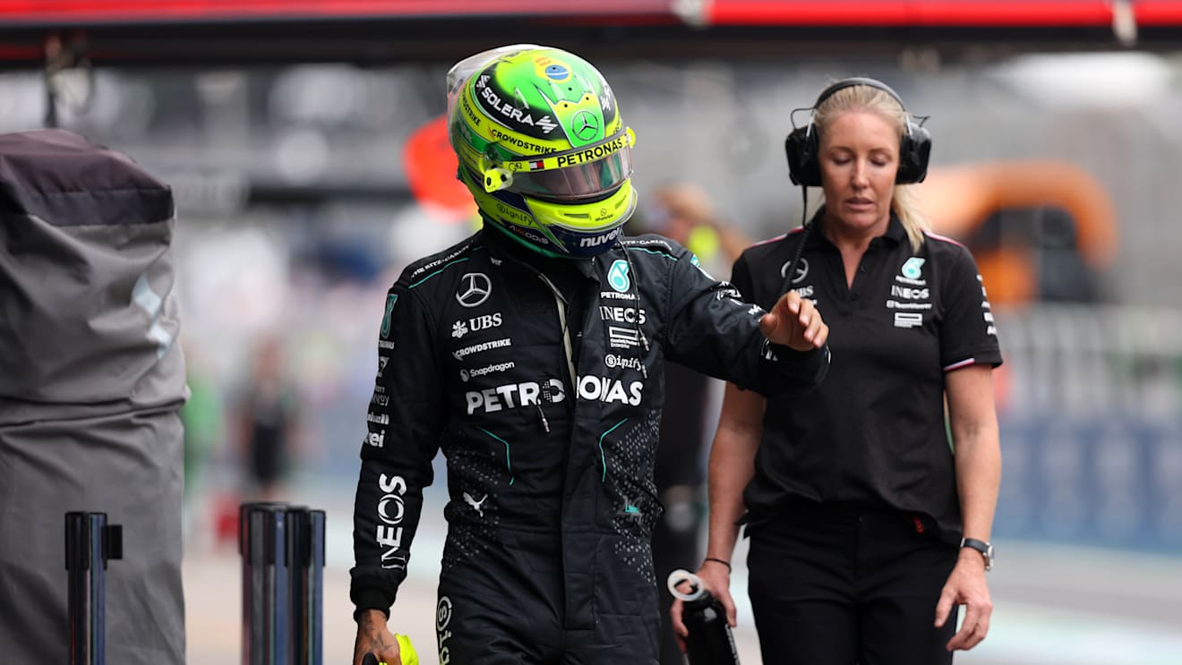 SAO PAULO, BRAZIL - NOVEMBER 01: 11th placed qualifier Lewis Hamilton of Great Britain and Mercedes walks in the Pitlane during Sprint Qualifying ahead of the F1 Grand Prix of Brazil at Autodromo Jose Carlos Pace on November 01, 2024 in Sao Paulo, Brazil. (Photo by Lars Baron - Formula 1/Formula 1 via Getty Images)