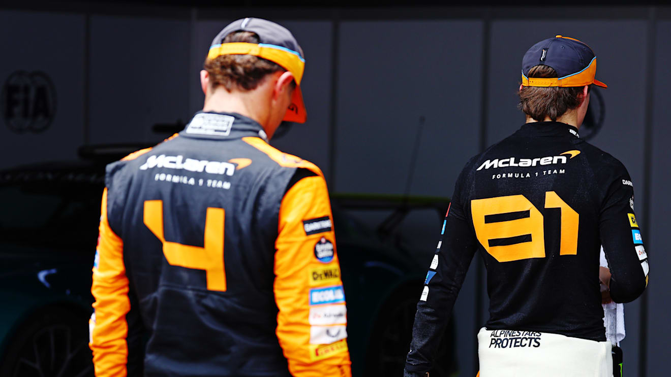SAO PAULO, BRAZIL - NOVEMBER 02: Sprint winner Lando Norris of Great Britain and McLaren and Second placed Oscar Piastri of Australia and McLaren walk in parc ferme during the Sprint ahead of the F1 Grand Prix of Brazil at Autodromo Jose Carlos Pace on November 02, 2024 in Sao Paulo, Brazil. (Photo by Mark Thompson/Getty Images)