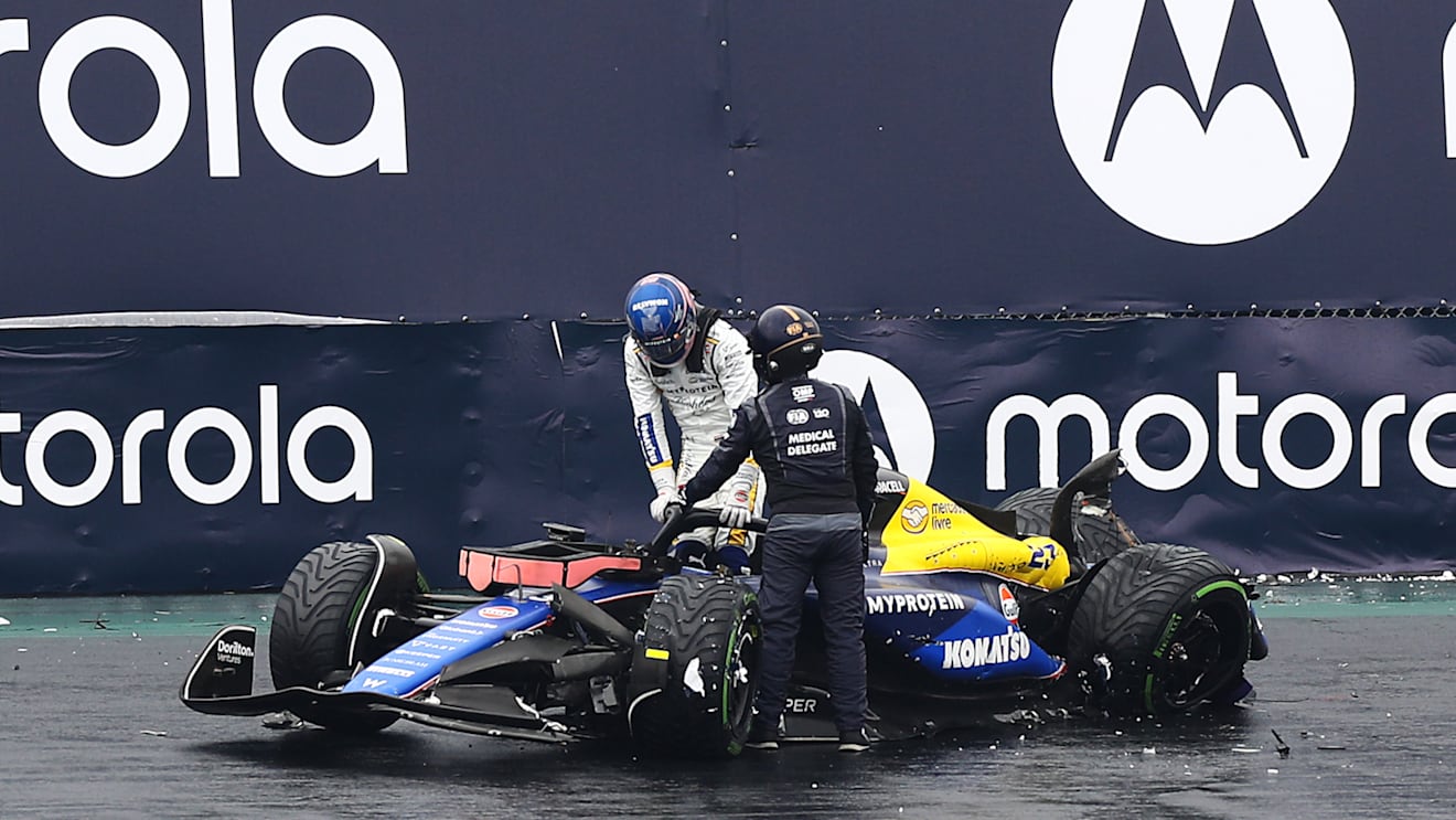 SAO PAULO, BRAZIL - NOVEMBER 03: Alexander Albon of Thailand and Williams climbs from his car after crashing during qualifying ahead of the F1 Grand Prix of Brazil at Autodromo Jose Carlos Pace on November 03, 2024 in Sao Paulo, Brazil. (Photo by Peter Fox - Formula 1/Formula 1 via Getty Images)