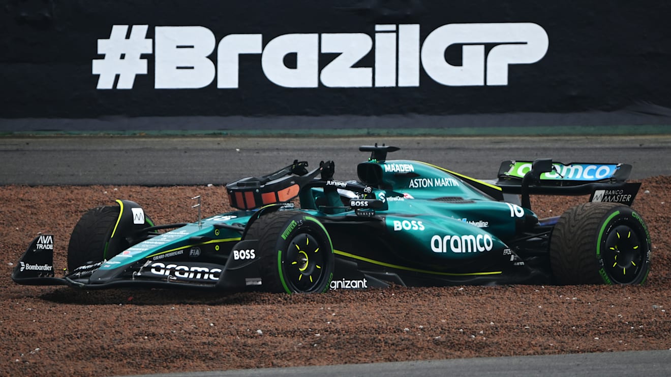 SAO PAULO, BRAZIL - NOVEMBER 03: Lance Stroll of Canada driving the (18) Aston Martin AMR24 Mercedes beaches his car in the gravel during the F1 Grand Prix of Brazil at Autodromo Jose Carlos Pace on November 03, 2024 in Sao Paulo, Brazil. (Photo by Clive Mason/Getty Images)