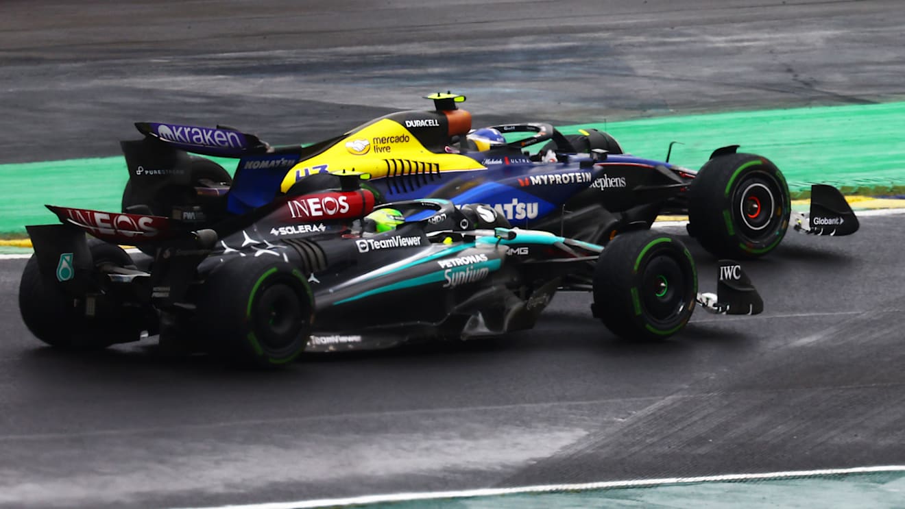 SAO PAULO, BRAZIL - NOVEMBER 03: Lewis Hamilton of Great Britain driving the (44) Mercedes AMG Petronas F1 Team W15 and Franco Colapinto of Argentina driving the (43) Williams FW45 Mercedes battle for position during the F1 Grand Prix of Brazil at Autodromo Jose Carlos Pace on November 03, 2024 in Sao Paulo, Brazil. (Photo by Mark Thompson/Getty Images)