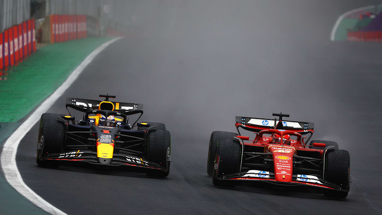 SAO PAULO, BRAZIL - NOVEMBER 03: Charles Leclerc of Monaco driving the (16) Ferrari SF-24 and Max Verstappen of the Netherlands driving the (1) Oracle Red Bull Racing RB20 battle for position during the F1 Grand Prix of Brazil at Autodromo Jose Carlos Pace on November 03, 2024 in Sao Paulo, Brazil. (Photo by Mark Thompson/Getty Images)