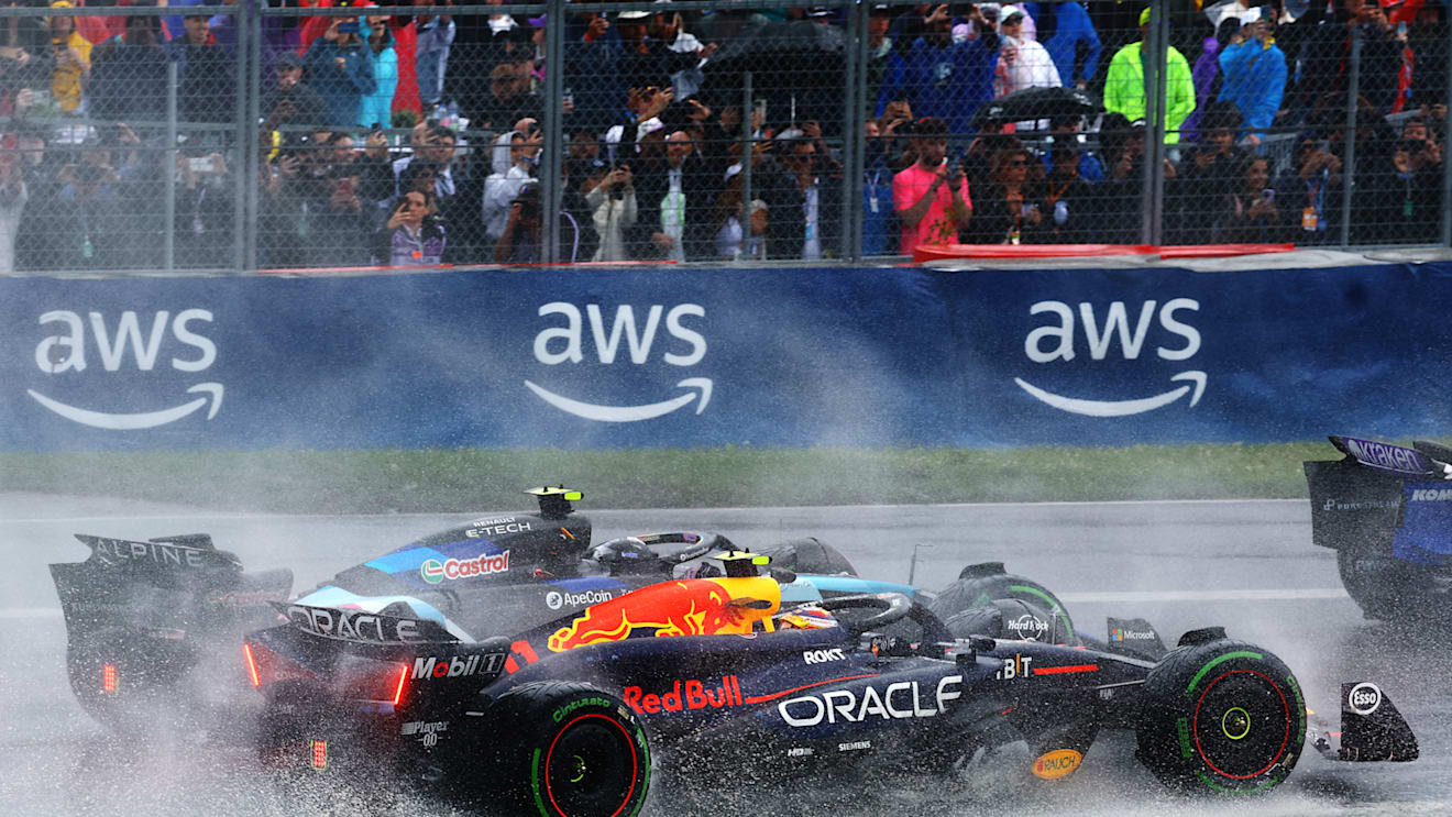 MONTREAL, QUEBEC - JUNE 09: Sergio Perez of Mexico driving the (11) Oracle Red Bull Racing RB20 battles for position with Esteban Ocon of France driving the (31) Alpine F1 A524 Renault on track during the F1 Grand Prix of Canada at Circuit Gilles Villeneuve on June 09, 2024 in Montreal, Quebec. (Photo by Mark Thompson/Getty Images)