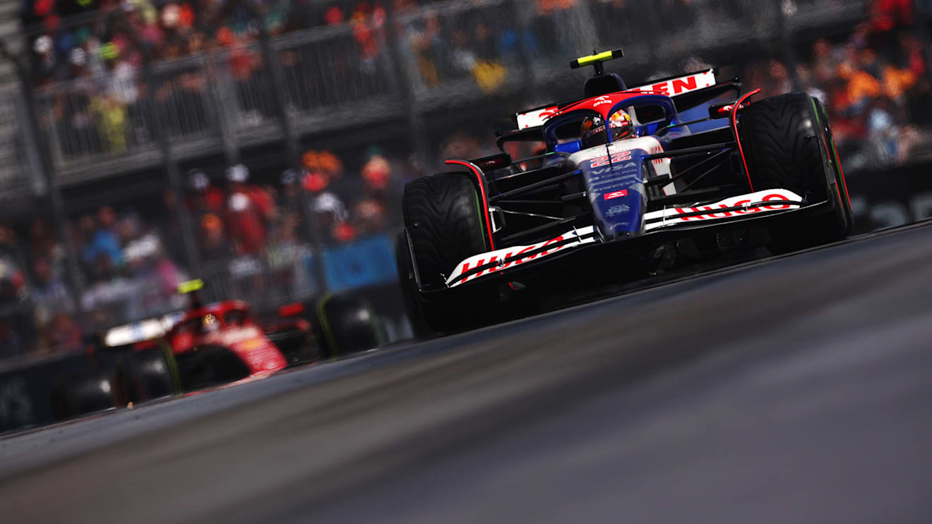 MONTREAL, QUEBEC - JUNE 09: Yuki Tsunoda of Japan driving the (22) Visa Cash App RB VCARB 01 leads Carlos Sainz of Spain driving (55) the Ferrari SF-24 on track  during the F1 Grand Prix of Canada at Circuit Gilles Villeneuve on June 09, 2024 in Montreal, Quebec. (Photo by Jared C. Tilton - Formula 1/Formula 1 via Getty Images)