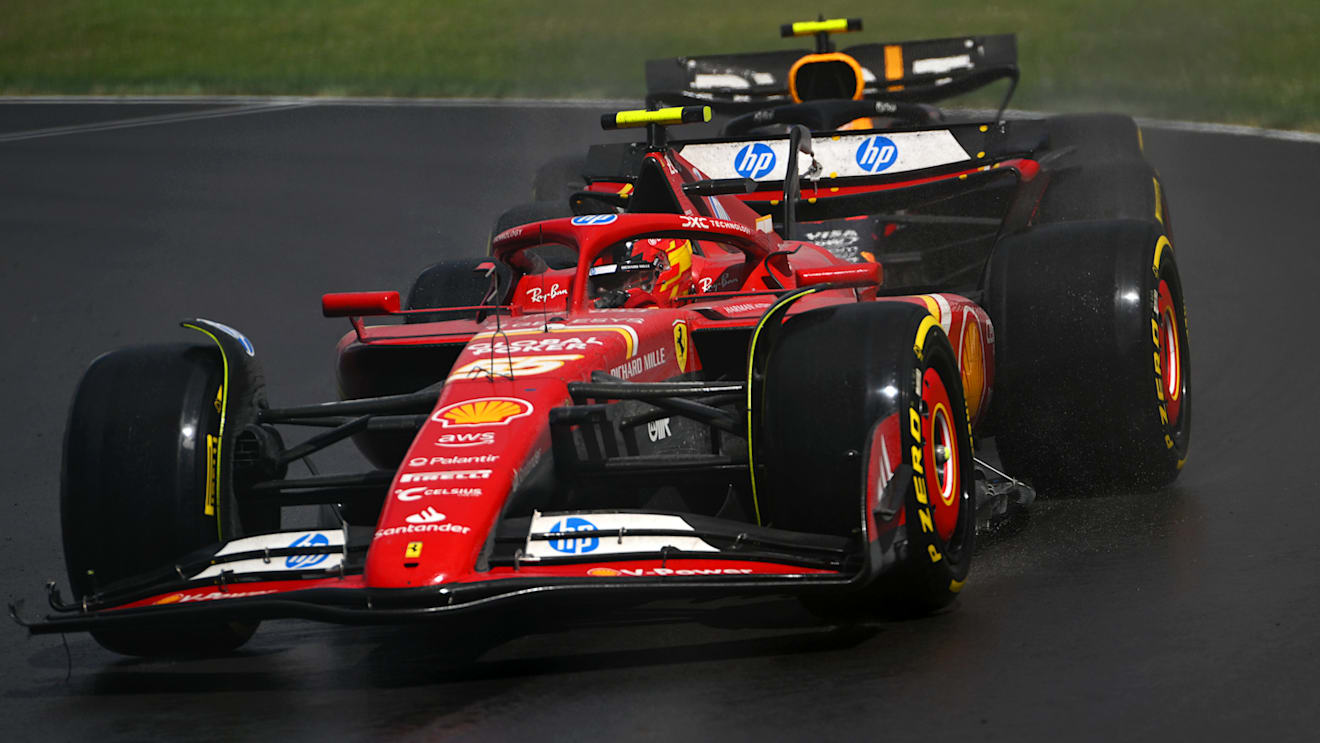 MONTREAL, QUEBEC - JUNE 09: Carlos Sainz of Spain driving (55) the Ferrari SF-24 leads Sergio Perez of Mexico driving the (11) Oracle Red Bull Racing RB20 on track during the F1 Grand Prix of Canada at Circuit Gilles Villeneuve on June 09, 2024 in Montreal, Quebec. (Photo by Rudy Carezzevoli/Getty Images)