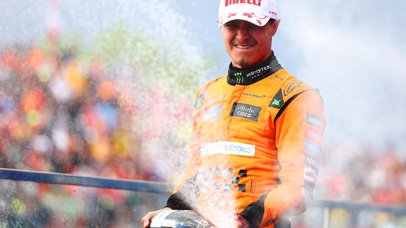 MONTREAL, QUEBEC - JUNE 09: Second placed Lando Norris of Great Britain and McLaren celebrates on the podium after the F1 Grand Prix of Canada at Circuit Gilles Villeneuve on June 09, 2024 in Montreal, Quebec. (Photo by Bryn Lennon - Formula 1/Formula 1 via Getty Images)