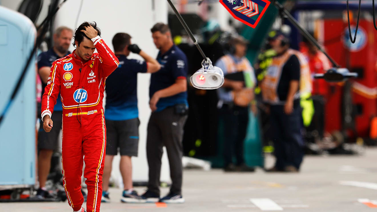 MONTREAL, QUEBEC - JUNE 08: 12th placed qualifier Carlos Sainz of Spain and Ferrari walks in the Pitlane during qualifying ahead of the F1 Grand Prix of Canada at Circuit Gilles Villeneuve on June 08, 2024 in Montreal, Quebec. (Photo by Chris Graythen/Getty Images)