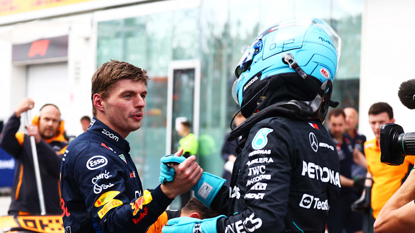 MONTREAL, QUEBEC - JUNE 08: Pole position qualifier George Russell of Great Britain and Mercedes and Second placed qualifier Max Verstappen of the Netherlands and Oracle Red Bull Racing celebrate in parc ferme during qualifying ahead of the F1 Grand Prix of Canada at Circuit Gilles Villeneuve on June 08, 2024 in Montreal, Quebec. (Photo by Mark Thompson/Getty Images)