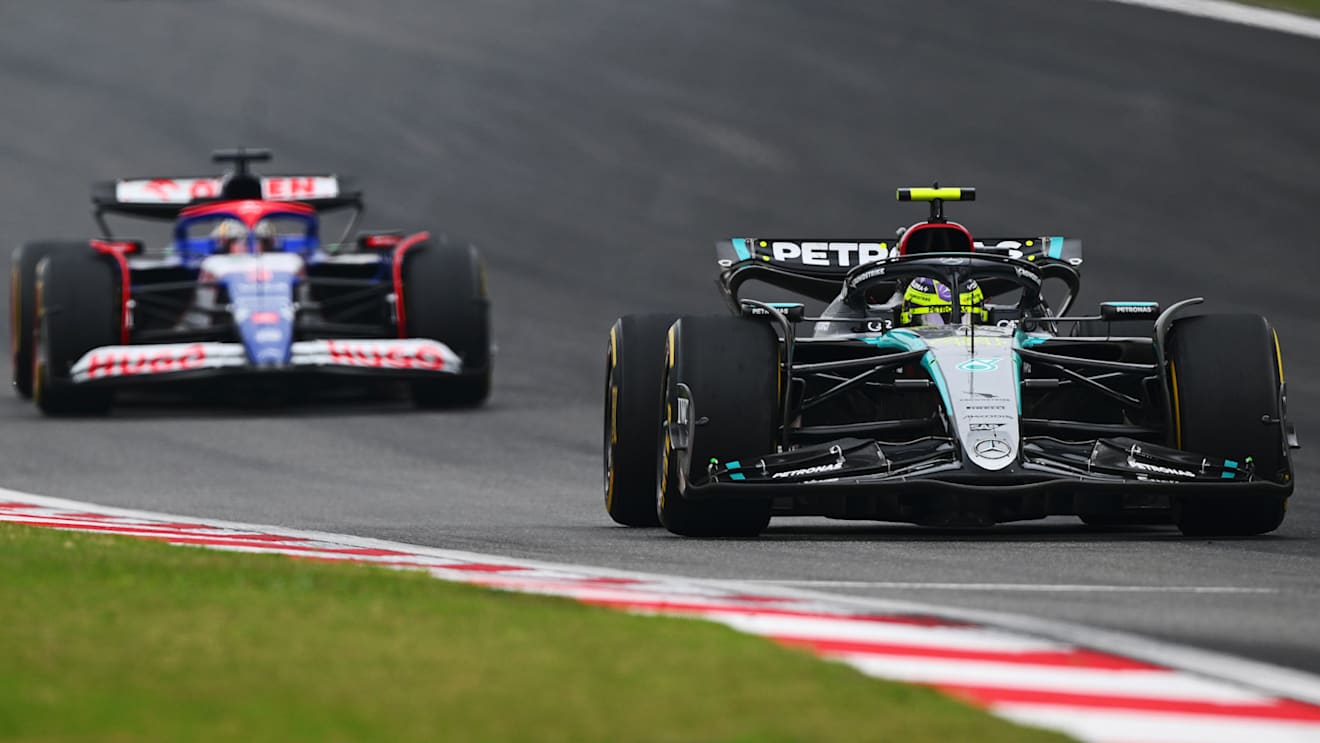 SHANGHAI, CHINA - APRIL 21: Lewis Hamilton of Great Britain driving the (44) Mercedes AMG Petronas F1 Team W15 leads Daniel Ricciardo of Australia driving the (3) Visa Cash App RB VCARB 01 on track during the F1 Grand Prix of China at Shanghai International Circuit on April 21, 2024 in Shanghai, China. (Photo by Clive Mason - Formula 1/Formula 1 via Getty Images)