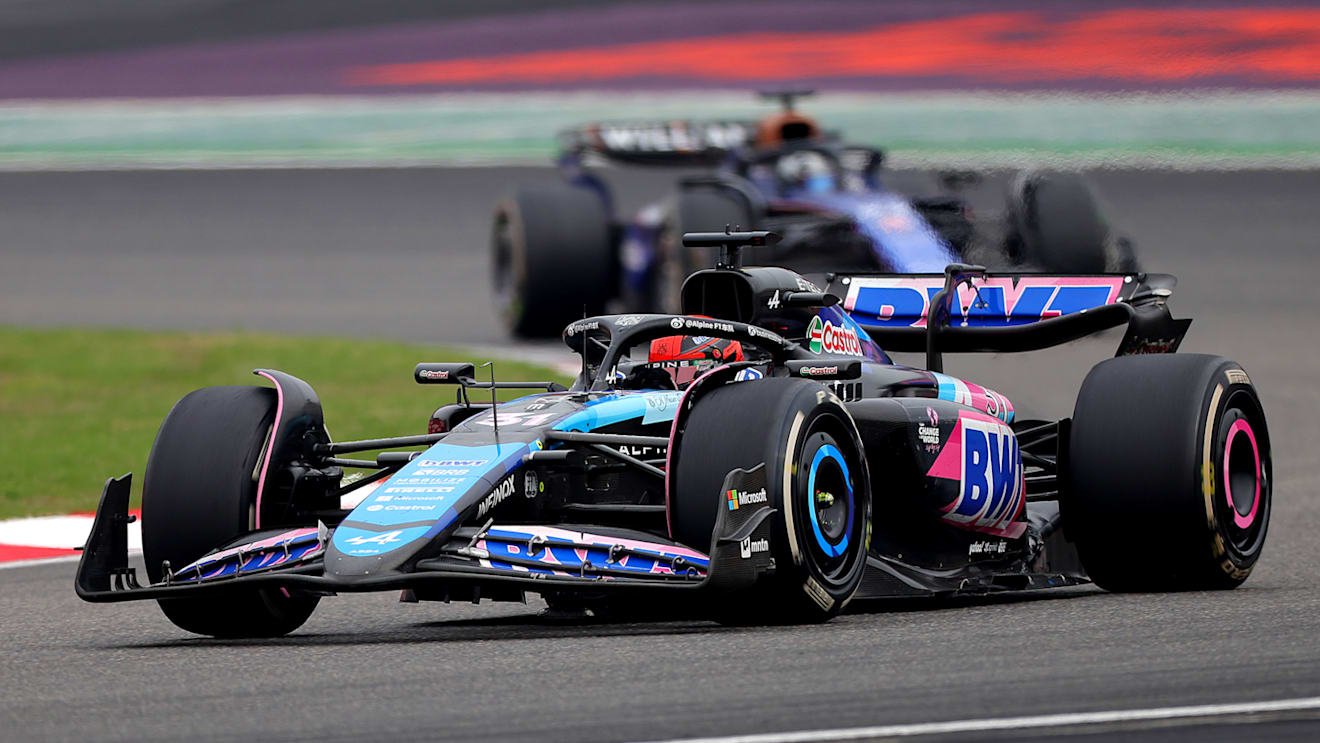 SHANGHAI, CHINA - APRIL 21: Esteban Ocon of France driving the (31) Alpine F1 A524 Renault leads Alexander Albon of Thailand driving the (23) Williams FW46 Mercedes on track during the F1 Grand Prix of China at Shanghai International Circuit on April 21, 2024 in Shanghai, China. (Photo by Lintao Zhang/Getty Images )