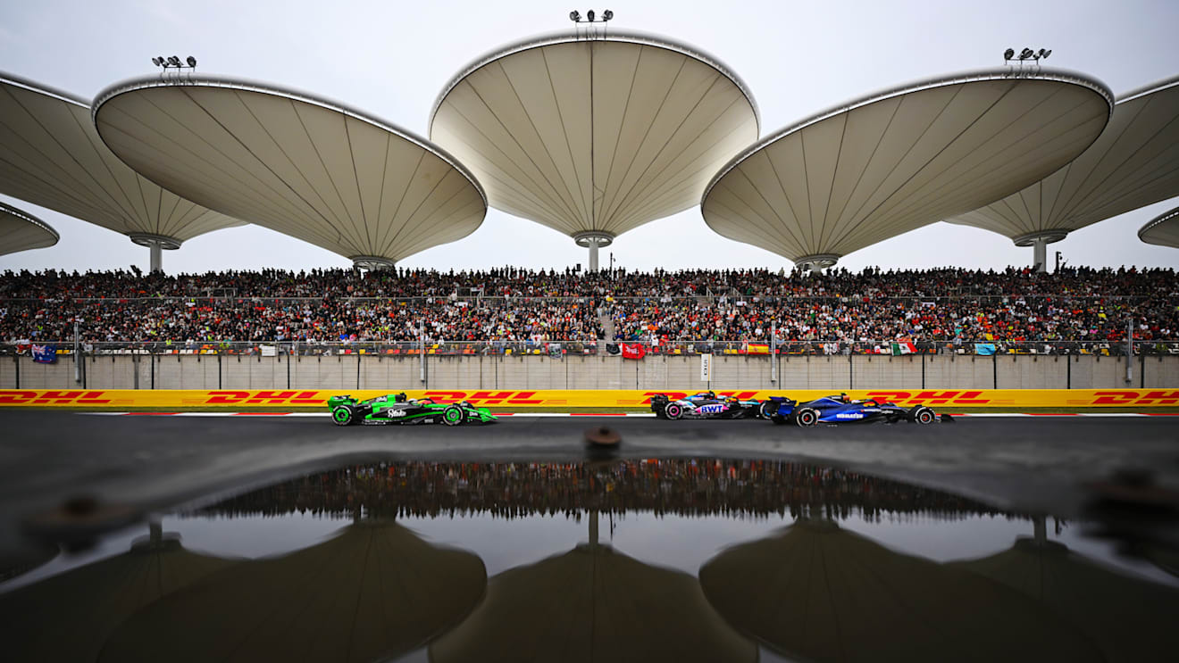 SHANGHAI, CHINA - APRIL 21: Logan Sargeant of United States driving the (2) Williams FW46 Mercedes leads Pierre Gasly of France driving the (10) Alpine F1 A524 Renault and Zhou Guanyu of China driving the (24) Kick Sauber C44 Ferrari on track during the F1 Grand Prix of China at Shanghai International Circuit on April 21, 2024 in Shanghai, China. (Photo by Clive Mason - Formula 1/Formula 1 via Getty Images)