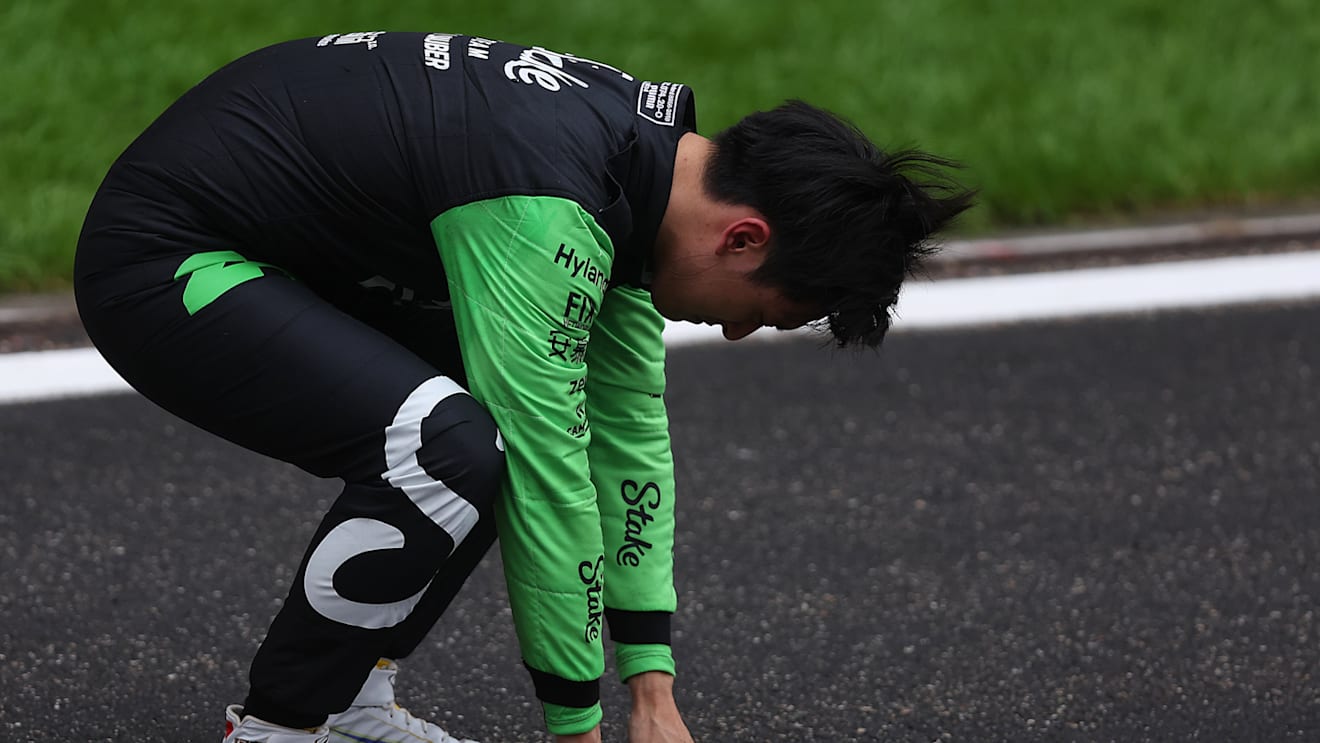 SHANGHAI, CHINA - APRIL 21: 13th placed Zhou Guanyu of China and Stake F1 Team Kick Sauber reacts in parc ferme during the F1 Grand Prix of China at Shanghai International Circuit on April 21, 2024 in Shanghai, China. (Photo by Lars Baron/Getty Images)
