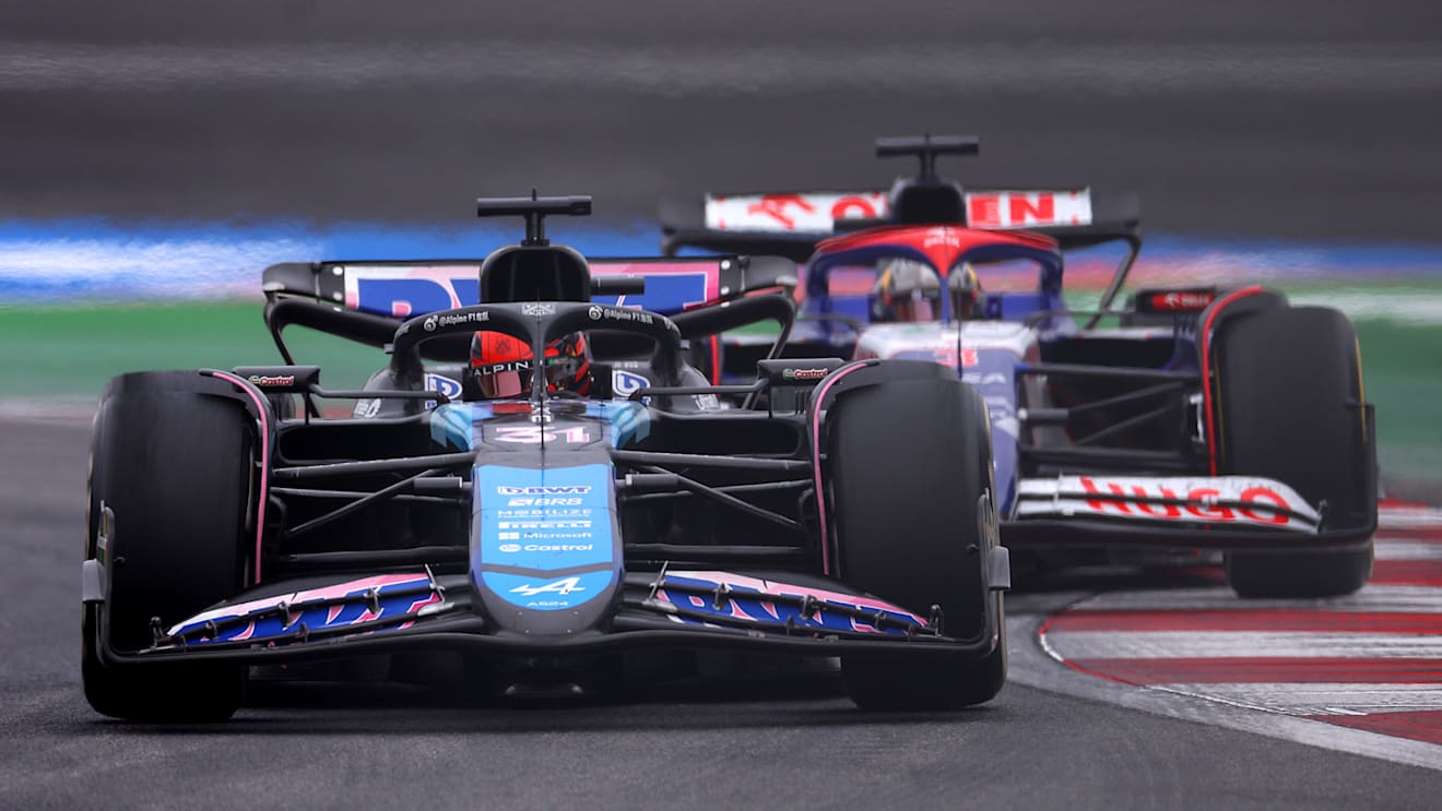 SHANGHAI, CHINA - APRIL 21: Esteban Ocon of France driving the (31) Alpine F1 A524 Renault leads Daniel Ricciardo of Australia driving the (3) Visa Cash App RB VCARB 01 on track during the F1 Grand Prix of China at Shanghai International Circuit on April 21, 2024 in Shanghai, China. (Photo by Lars Baron/Getty Images)