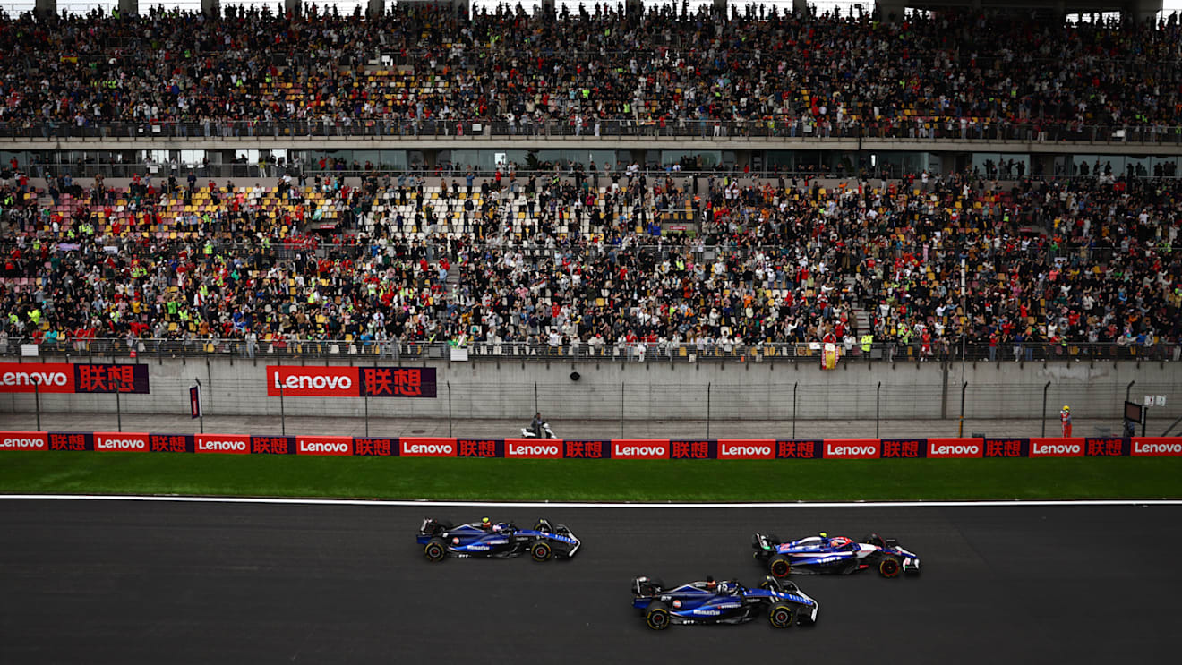 SHANGHAI, CHINA - APRIL 20: Yuki Tsunoda of Japan driving the (22) Visa Cash App RB VCARB 01 leads Alexander Albon of Thailand driving the (23) Williams FW46 Mercedes and Logan Sargeant of United States driving the (2) Williams FW46 Mercedes on track during the Sprint ahead of the F1 Grand Prix of China at Shanghai International Circuit on April 20, 2024 in Shanghai, China. (Photo by Bryn Lennon - Formula 1/Formula 1 via Getty Images)