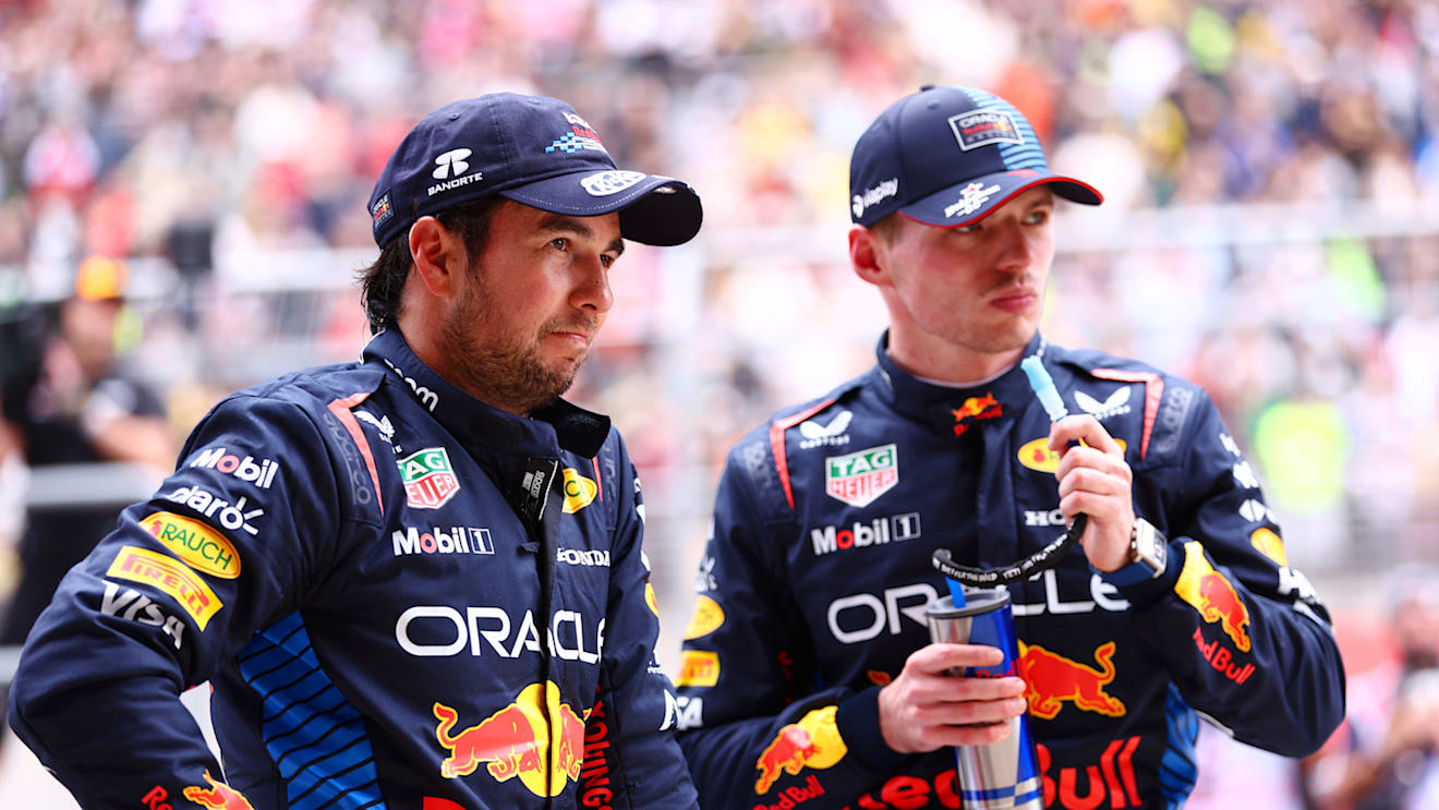 SHANGHAI, CHINA - APRIL 20: Sprint winner Max Verstappen of the Netherlands and Oracle Red Bull Racing and Third placed Sergio Perez of Mexico and Oracle Red Bull Racing look on in parc ferme during the Sprint ahead of the F1 Grand Prix of China at Shanghai International Circuit on April 20, 2024 in Shanghai, China. (Photo by Bryn Lennon - Formula 1/Formula 1 via Getty Images)