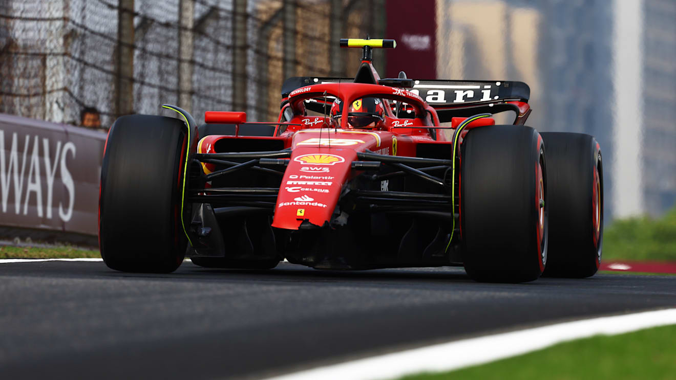 SHANGHAI, CHINA - APRIL 20: Carlos Sainz of Spain and Ferrari returns to the pitlane after crashing his Ferrari SF-24 during qualifying ahead of the F1 Grand Prix of China at Shanghai International Circuit on April 20, 2024 in Shanghai, China. (Photo by Mark Thompson/Getty Images)