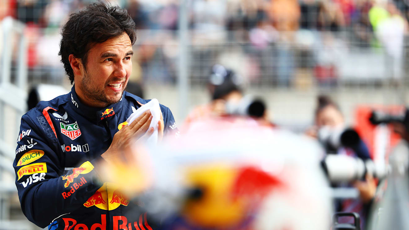 SHANGHAI, CHINA - APRIL 20: Second placed qualifier Sergio Perez of Mexico and Oracle Red Bull Racing looks on in parc ferme after qualifying ahead of the F1 Grand Prix of China at Shanghai International Circuit on April 20, 2024 in Shanghai, China. (Photo by Mark Thompson/Getty Images)