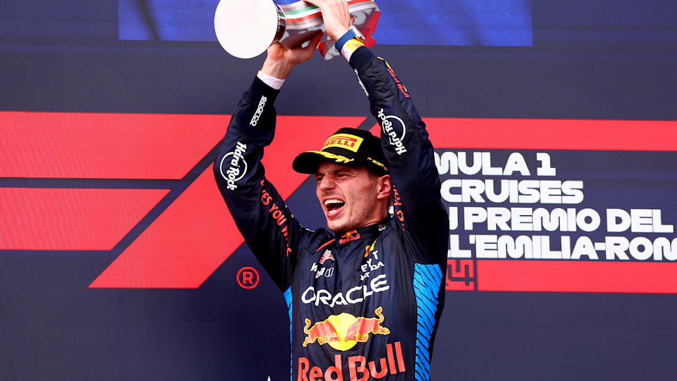 IMOLA, ITALY - MAY 19: Race winner Max Verstappen of the Netherlands and Oracle Red Bull Racing celebrates on the podium during the F1 Grand Prix of Emilia-Romagna at Autodromo Enzo e Dino Ferrari Circuit on May 19, 2024 in Imola, Italy. (Photo by Clive Rose/Getty Images)