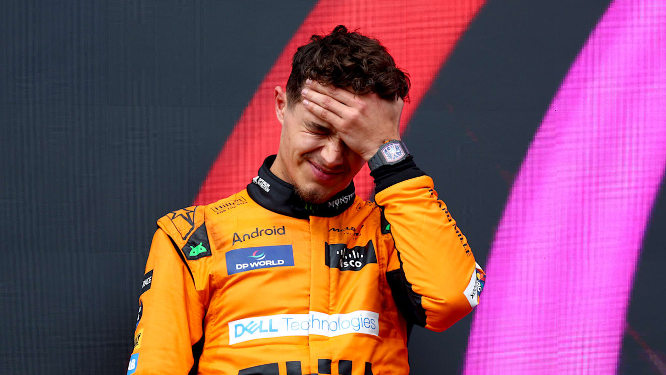IMOLA, ITALY - MAY 19: Second placed Lando Norris of Great Britain and McLaren celebrates on the podium during the F1 Grand Prix of Emilia-Romagna at Autodromo Enzo e Dino Ferrari Circuit on May 19, 2024 in Imola, Italy. (Photo by Clive Rose/Getty Images)