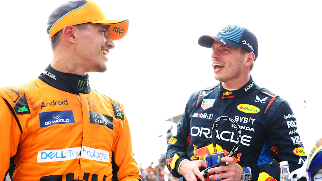IMOLA, ITALY - MAY 19: Race winner Max Verstappen of the Netherlands and Oracle Red Bull Racing and Second placed Lando Norris of Great Britain and McLaren talk in parc ferme during the F1 Grand Prix of Emilia-Romagna at Autodromo Enzo e Dino Ferrari Circuit on May 19, 2024 in Imola, Italy. (Photo by Mark Thompson/Getty Images)