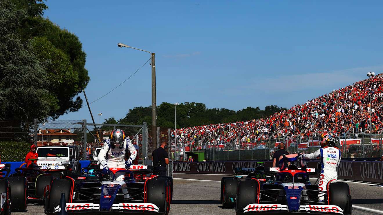IMOLA, ITALY - MAY 18: 7th placed qualifier Yuki Tsunoda of Japan and Visa Cash App RB and 9th placed qualifier Daniel Ricciardo of Australia and Visa Cash App RB stop in parc ferme during qualifying ahead of the F1 Grand Prix of Emilia-Romagna at Autodromo Enzo e Dino Ferrari Circuit on May 18, 2024 in Imola, Italy. (Photo by Mark Thompson/Getty Images)