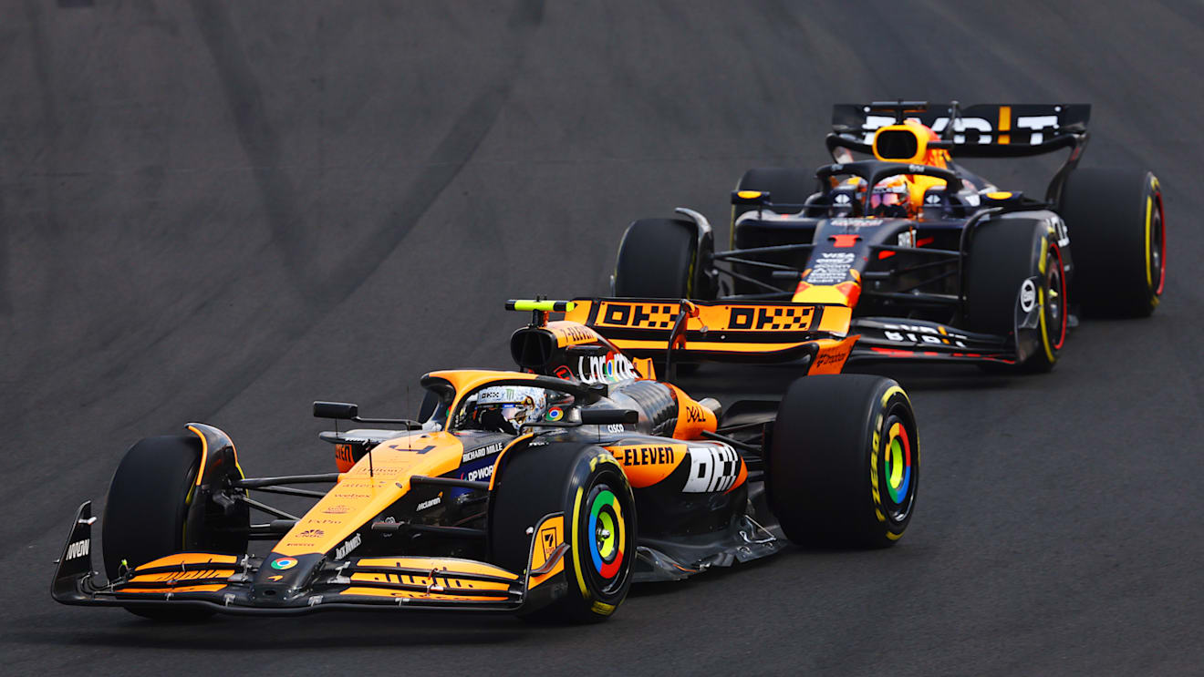 BUDAPEST, HUNGARY - JULY 21: Lando Norris of Great Britain driving the (4) McLaren MCL38 Mercedes leads Max Verstappen of the Netherlands driving the (1) Oracle Red Bull Racing RB20 during the F1 Grand Prix of Hungary at Hungaroring on July 21, 2024 in Budapest, Hungary. (Photo by Mark Thompson/Getty Images)
