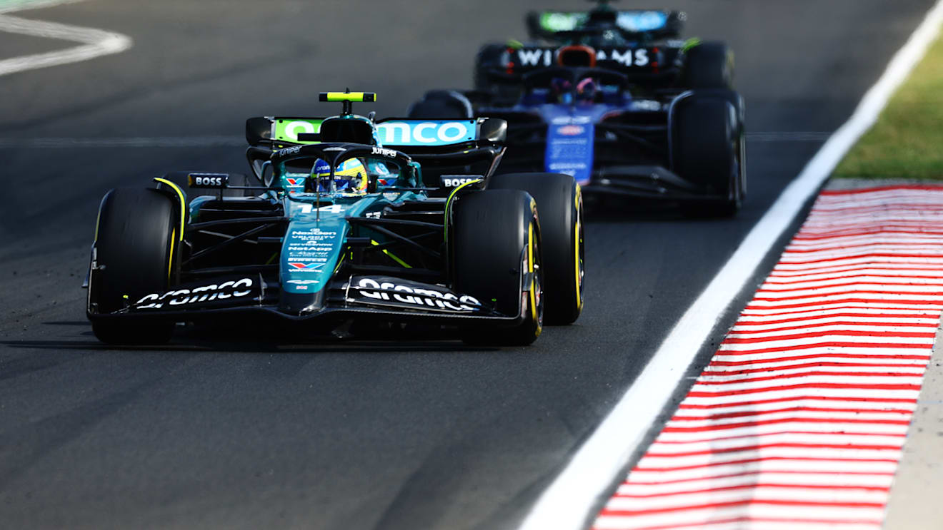 BUDAPEST, HUNGARY - JULY 21: Fernando Alonso of Spain driving the (14) Aston Martin AMR24 Mercedes on track during the F1 Grand Prix of Hungary at Hungaroring on July 21, 2024 in Budapest, Hungary. (Photo by Mark Thompson/Getty Images)
