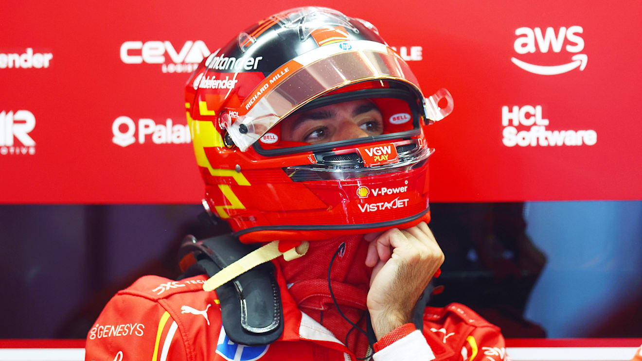 BUDAPEST, HUNGARY - JULY 19: Carlos Sainz of Spain and Ferrari prepares to drive itg during practice ahead of the F1 Grand Prix of Hungary at Hungaroring on July 19, 2024 in Budapest, Hungary. (Photo by Bryn Lennon - Formula 1/Formula 1 via Getty Images)