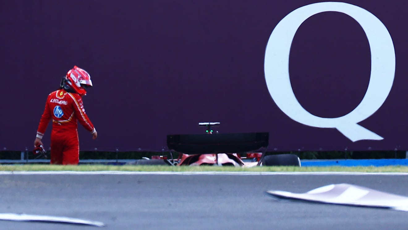 BUDAPEST, HUNGARY - JULY 19: Charles Leclerc of Monaco and Ferrari walks from his car after crashing during practice ahead of the F1 Grand Prix of Hungary at Hungaroring on July 19, 2024 in Budapest, Hungary. (Photo by Mark Thompson/Getty Images)