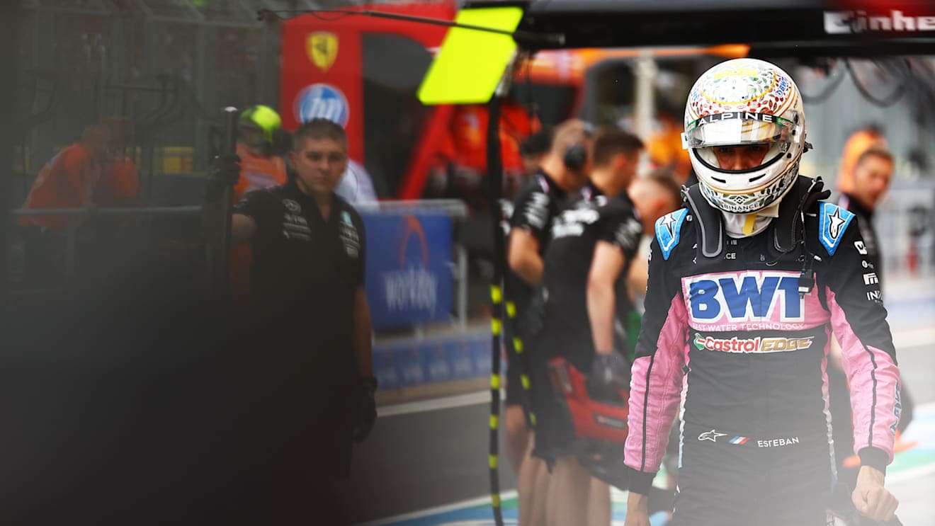 BUDAPEST, HUNGARY - JULY 20: 19th placed qualifier Esteban Ocon of France and Alpine F1 walks in the Pitlane during qualifying ahead of the F1 Grand Prix of Hungary at Hungaroring on July 20, 2024 in Budapest, Hungary. (Photo by Mark Thompson/Getty Images)