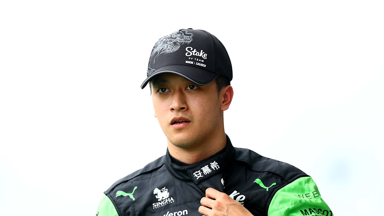 BUDAPEST, HUNGARY - JULY 20: 18th placed qualifier Zhou Guanyu of China and Stake F1 Team Kick Sauber walks in the Pitlane during qualifying ahead of the F1 Grand Prix of Hungary at Hungaroring on July 20, 2024 in Budapest, Hungary. (Photo by Bryn Lennon - Formula 1/Formula 1 via Getty Images)