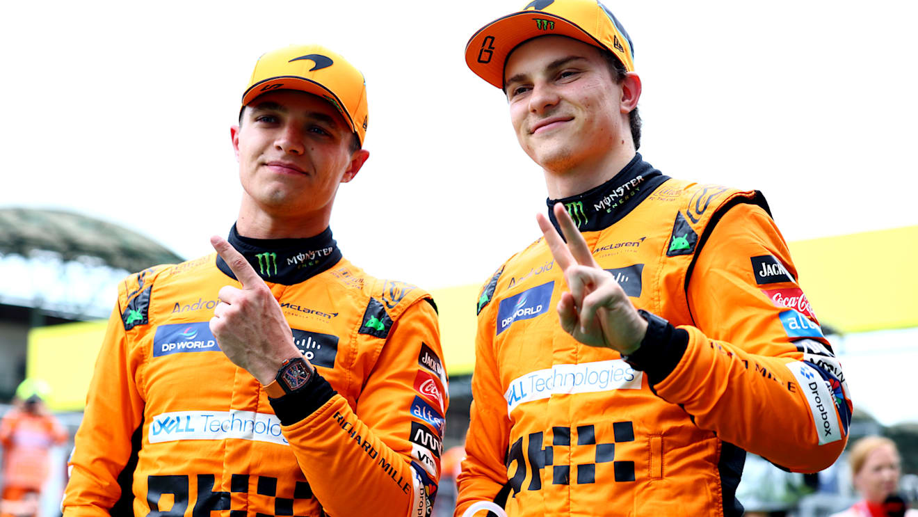 BUDAPEST, HUNGARY - JULY 20: Pole position qualifier Lando Norris of Great Britain and McLaren and Second placed qualifier Oscar Piastri of Australia and McLaren celebrates  in parc ferme during qualifying ahead of the F1 Grand Prix of Hungary at Hungaroring on July 20, 2024 in Budapest, Hungary. (Photo by Bryn Lennon - Formula 1/Formula 1 via Getty Images)