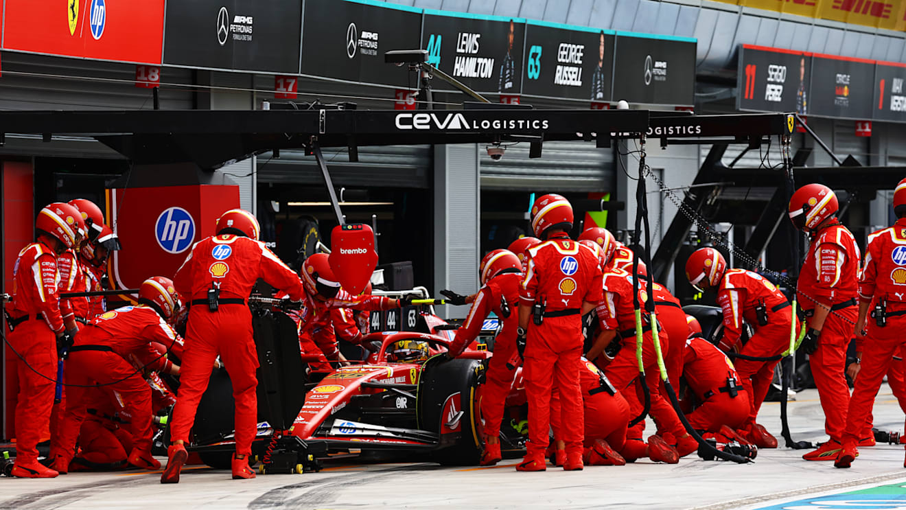 MONZA, ITALY - SEPTEMBER 01: Carlos Sainz of Spain driving (55) the Ferrari SF-24 stops in the Pitlane for a pit stop during the F1 Grand Prix of Italy at Autodromo Nazionale Monza on September 01, 2024 in Monza, Italy. (Photo by Mark Thompson/Getty Images)