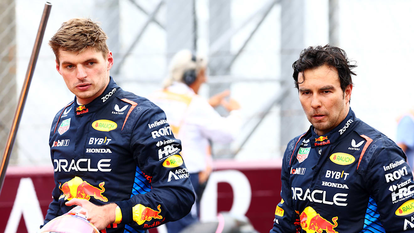 MONZA, ITALY - SEPTEMBER 01: Sixth place Max Verstappen of the Netherlands and Oracle Red Bull Racing and eighth place Sergio Perez of Mexico and Oracle Red Bull Racing, look on in parc ferme  during the F1 Grand Prix of Italy at Autodromo Nazionale Monza on September 01, 2024 in Monza, Italy. (Photo by Mark Thompson/Getty Images)