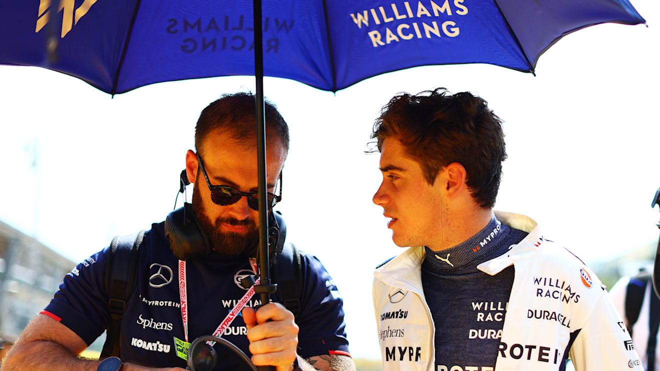MONZA, ITALY - SEPTEMBER 01: Franco Colapinto of Argentina and Williams talks to a Williams team member during the F1 Grand Prix of Italy at Autodromo Nazionale Monza on September 01, 2024 in Monza, Italy. (Photo by Clive Rose/Getty Images)
