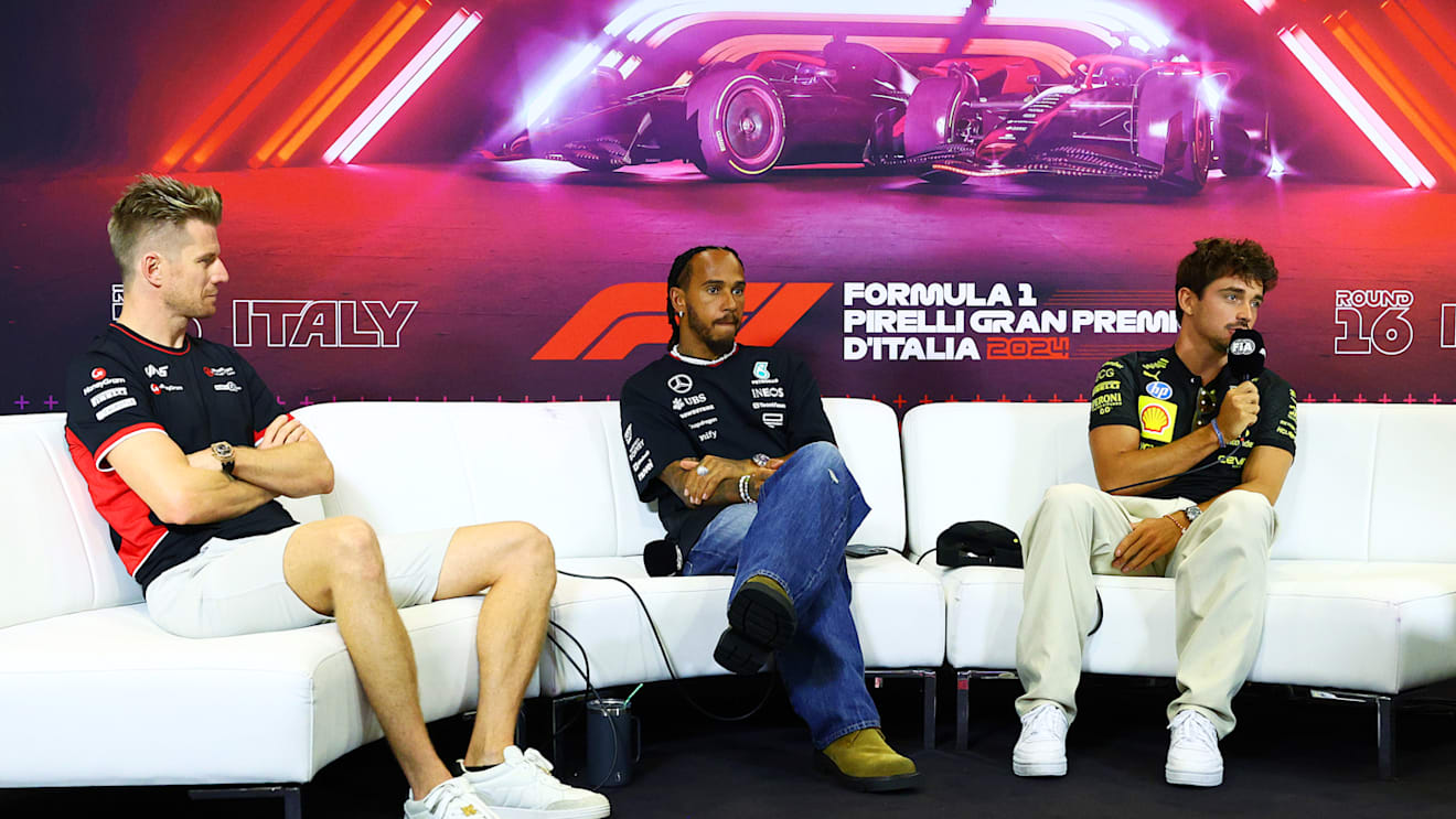 MONZA, ITALY - AUGUST 29: (L-R) Nico Hulkenberg of Germany and Haas F1, Lewis Hamilton of Great Britain and Mercedes and Charles Leclerc of Monaco and Ferrari attend the Drivers Press Conference during previews ahead of the F1 Grand Prix of Italy at Autodromo Nazionale Monza on August 29, 2024 in Monza, Italy. (Photo by Clive Rose/Getty Images)