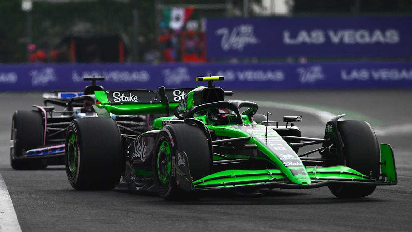 MEXICO CITY, MEXICO - OCTOBER 27: Zhou Guanyu of China driving the (24) Kick Sauber C44 Ferrari leads Esteban Ocon of France driving the (31) Alpine F1 A524 Renault on track during the F1 Grand Prix of Mexico at Autodromo Hermanos Rodriguez on October 27, 2024 in Mexico City, Mexico. (Photo by Rudy Carezzevoli/Getty Images)