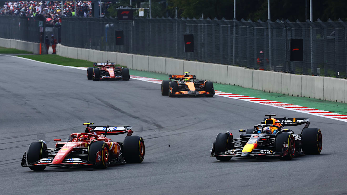 MEXICO CITY, MEXICO - OCTOBER 27: Carlos Sainz of Spain driving (55) the Ferrari SF-24 leads Max Verstappen of the Netherlands driving the (1) Oracle Red Bull Racing RB20 on track during the F1 Grand Prix of Mexico at Autodromo Hermanos Rodriguez on October 27, 2024 in Mexico City, Mexico. (Photo by Mark Thompson/Getty Images)