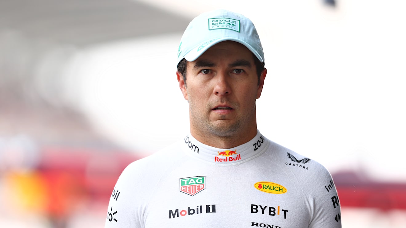 MEXICO CITY, MEXICO - OCTOBER 26: 18th placed qualifier Sergio Perez of Mexico and Oracle Red Bull Racing walks in the Pitlane during qualifying ahead of the F1 Grand Prix of Mexico at Autodromo Hermanos Rodriguez on October 26, 2024 in Mexico City, Mexico. (Photo by Bryn Lennon - Formula 1/Formula 1 via Getty Images)
