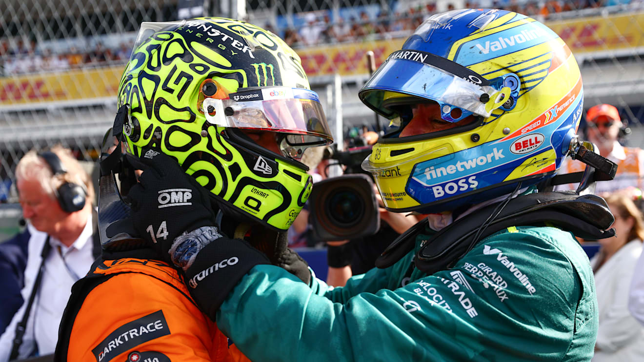 MIAMI, FLORIDA - MAY 05: Race winner Lando Norris of Great Britain and McLaren celebrates with Fernando Alonso of Spain and Aston Martin F1 Team in parc ferme after the F1 Grand Prix of Miami at Miami International Autodrome on May 05, 2024 in Miami, Florida. (Photo by Clive Rose - Formula 1/Formula 1 via Getty Images)