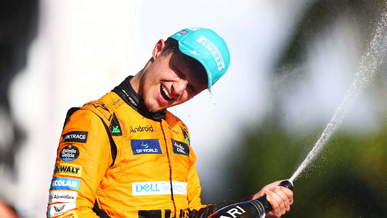 MIAMI, FLORIDA - MAY 05: Race winner Lando Norris of Great Britain and McLaren celebrates on the podium after the F1 Grand Prix of Miami at Miami International Autodrome on May 05, 2024 in Miami, Florida. (Photo by Clive Rose - Formula 1/Formula 1 via Getty Images)