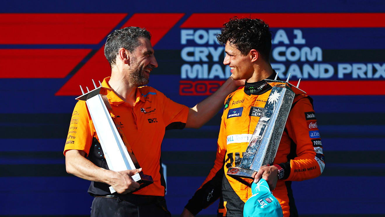 MIAMI, FLORIDA - MAY 05: Race winner Lando Norris of Great Britain and McLaren celebrates with McLaren Team Principal Andrea Stella on the podium after the F1 Grand Prix of Miami at Miami International Autodrome on May 05, 2024 in Miami, Florida. (Photo by Mark Thompson/Getty Images)