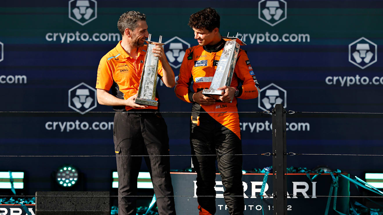 MIAMI, FLORIDA - MAY 05: Race winner Lando Norris of Great Britain and McLaren and McLaren Team Principal Andrea Stella celebrate on the podium after the F1 Grand Prix of Miami at Miami International Autodrome on May 05, 2024 in Miami, Florida. (Photo by Chris Graythen/Getty Images)