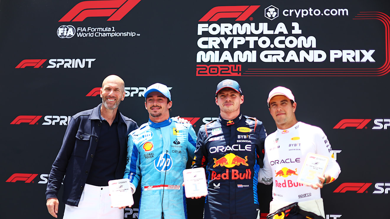 MIAMI, FLORIDA - MAY 04: Sprint winner Max Verstappen of the Netherlands and Oracle Red Bull Racing, Second placed Charles Leclerc of Monaco and Ferrari, Third placed Sergio Perez of Mexico and Oracle Red Bull Racing and Zinedine Zidane pose for a photo in parc ferme during the Sprint ahead of the F1 Grand Prix of Miami at Miami International Autodrome on May 04, 2024 in Miami, Florida. (Photo by Clive Rose - Formula 1/Formula 1 via Getty Images)