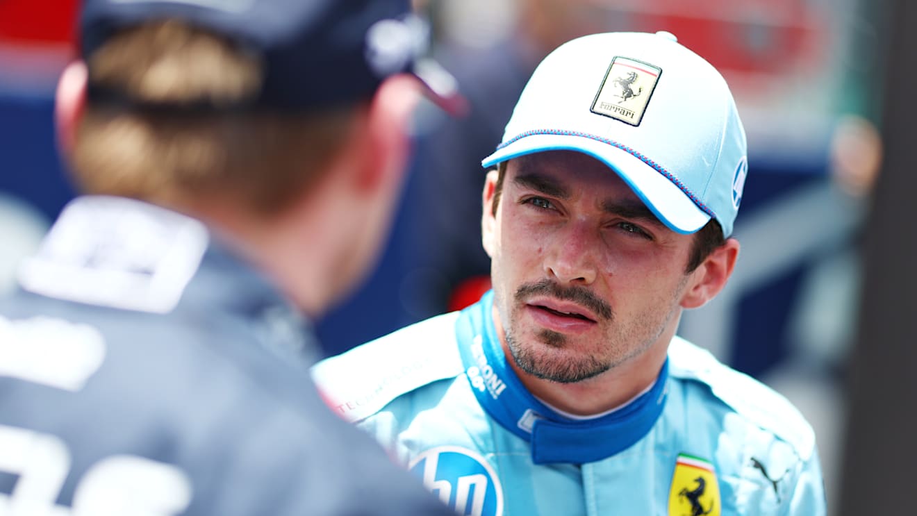 MIAMI, FLORIDA - MAY 04: Second placed Charles Leclerc of Monaco and Ferrari talks with sprint winner Max Verstappen of the Netherlands and Oracle Red Bull Racing in parc ferme during the Sprint ahead of the F1 Grand Prix of Miami at Miami International Autodrome on May 04, 2024 in Miami, Florida. (Photo by Clive Rose - Formula 1/Formula 1 via Getty Images)