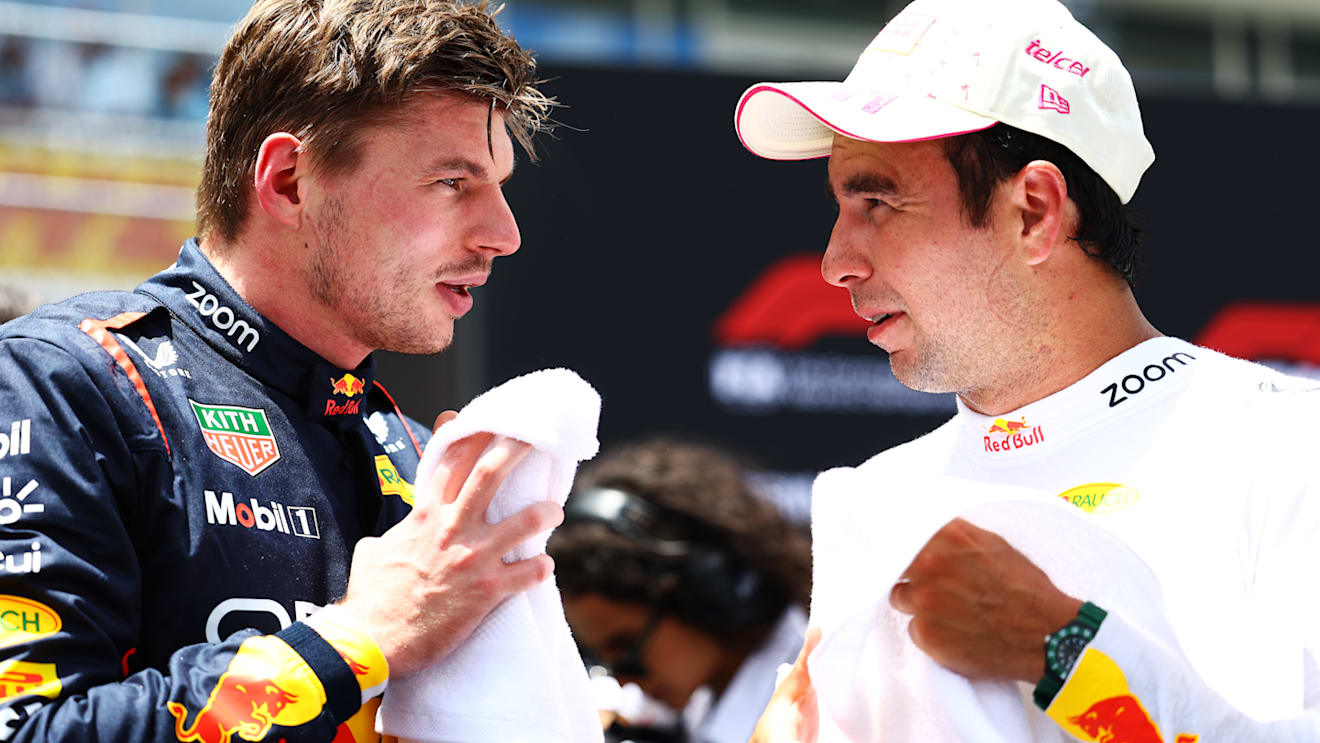 MIAMI, FLORIDA - MAY 04: Sprint winner Max Verstappen of the Netherlands and Oracle Red Bull Racing talks with Third placed Sergio Perez of Mexico and Oracle Red Bull Racing in parc ferme during the Sprint ahead of the F1 Grand Prix of Miami at Miami International Autodrome on May 04, 2024 in Miami, Florida. (Photo by Mark Thompson/Getty Images)