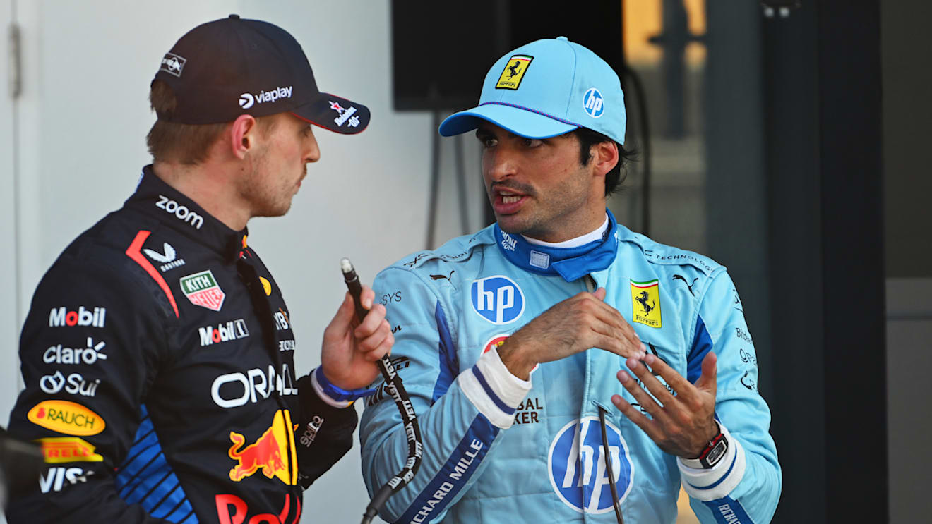 MIAMI, FLORIDA - MAY 04: Pole position qualifier Max Verstappen of the Netherlands and Oracle Red Bull Racing and Third placed qualifier Carlos Sainz of Spain and Ferrari talk in parc ferme during qualifying ahead of the F1 Grand Prix of Miami at Miami International Autodrome on May 04, 2024 in Miami, Florida. (Photo by Rudy Carezzevoli/Getty Images)