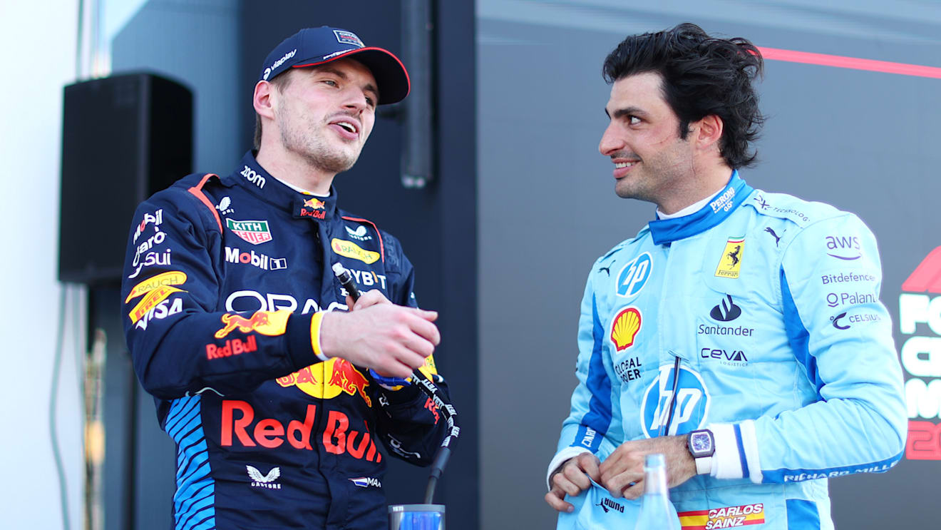 MIAMI, FLORIDA - MAY 04: Pole position qualifier Max Verstappen of the Netherlands and Oracle Red Bull Racing and Third placed qualifier Carlos Sainz of Spain and Ferrari talk in parc ferme during qualifying ahead of the F1 Grand Prix of Miami at Miami International Autodrome on May 04, 2024 in Miami, Florida. (Photo by Clive Rose - Formula 1/Formula 1 via Getty Images)