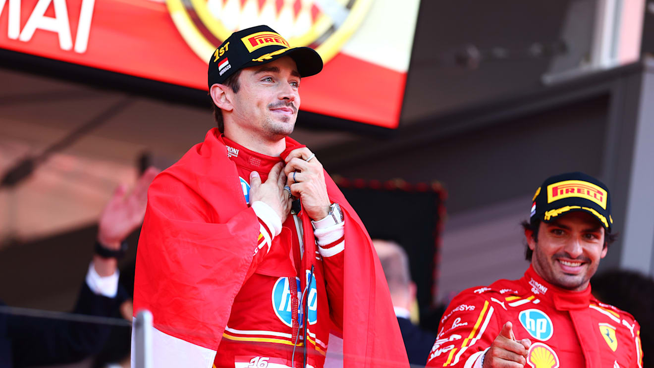 MONTE-CARLO, MONACO - MAY 26: Race winner Charles Leclerc of Monaco and Ferrari celebrates on the podium during the F1 Grand Prix of Monaco at Circuit de Monaco on May 26, 2024 in Monte-Carlo, Monaco. (Photo by Bryn Lennon - Formula 1/Formula 1 via Getty Images)
